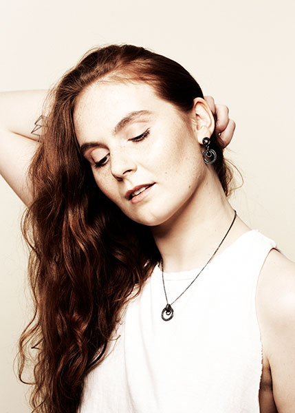 Red haired model with jewelry